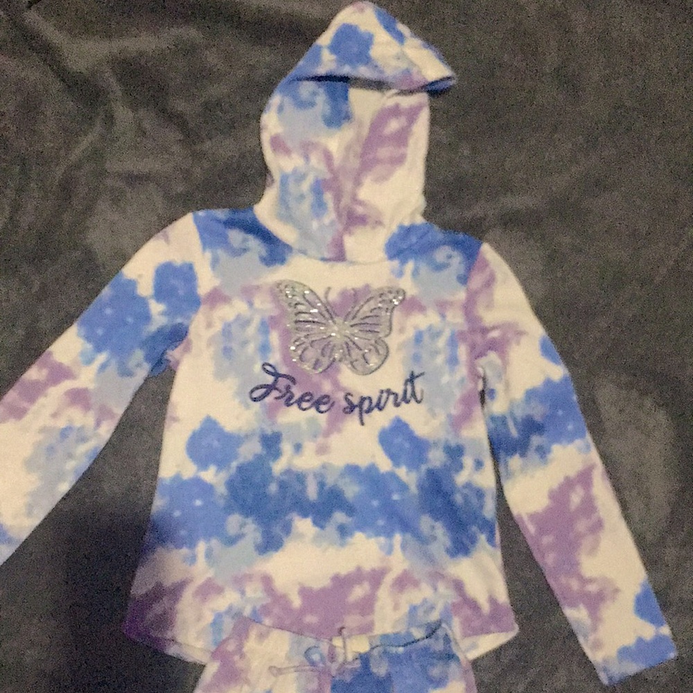 Purple white blue kind of tie dye color a set sweat pants and a long sleeve.